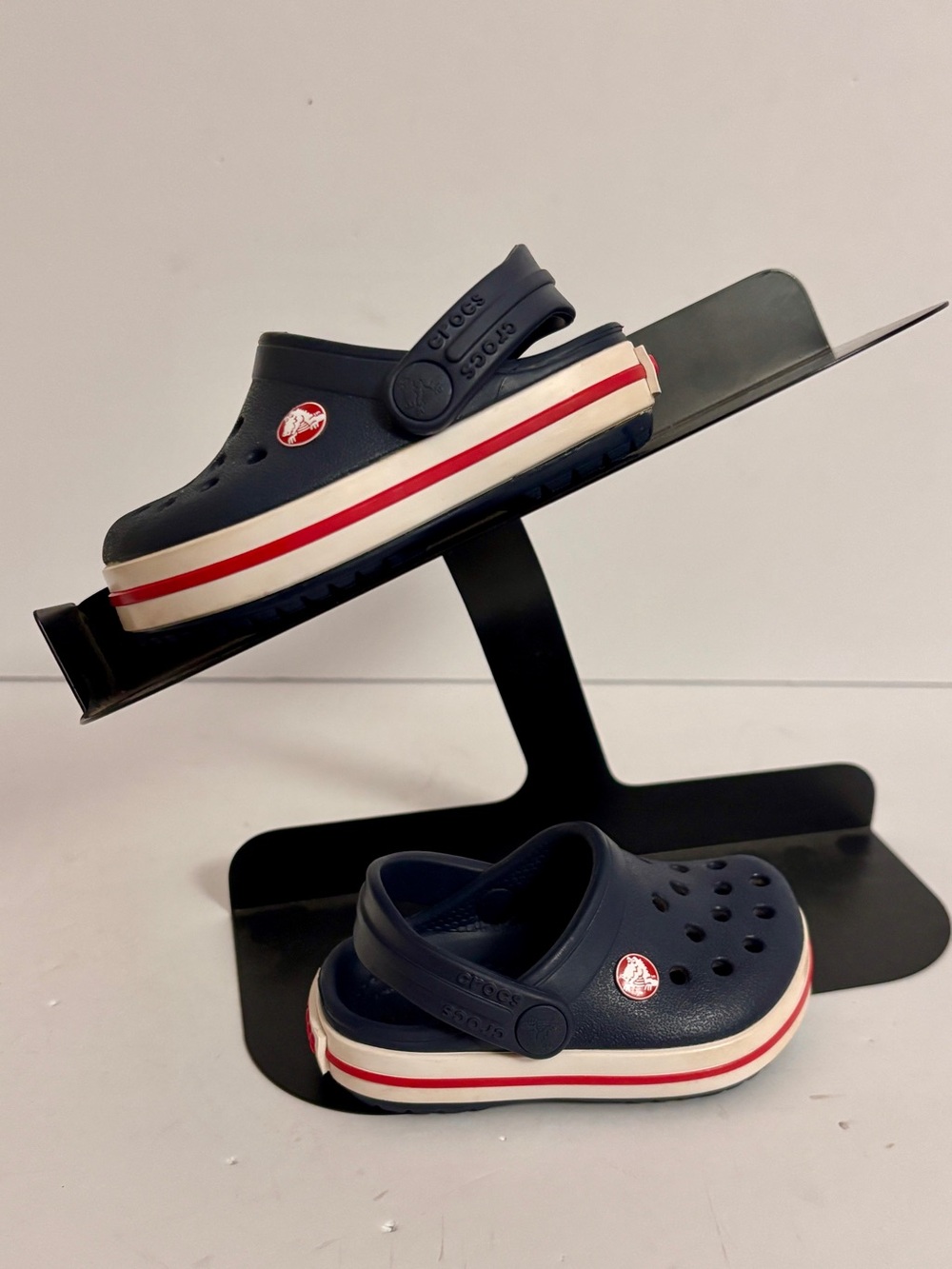 Crocs Kids Navy Clogs with Red & White Stripe - Comfortable Slip-On child size 4